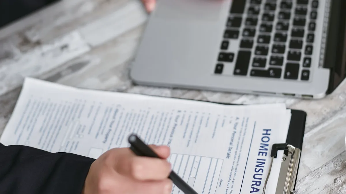 Homeowner reviewing and signing a home insurance policy on a clipboard